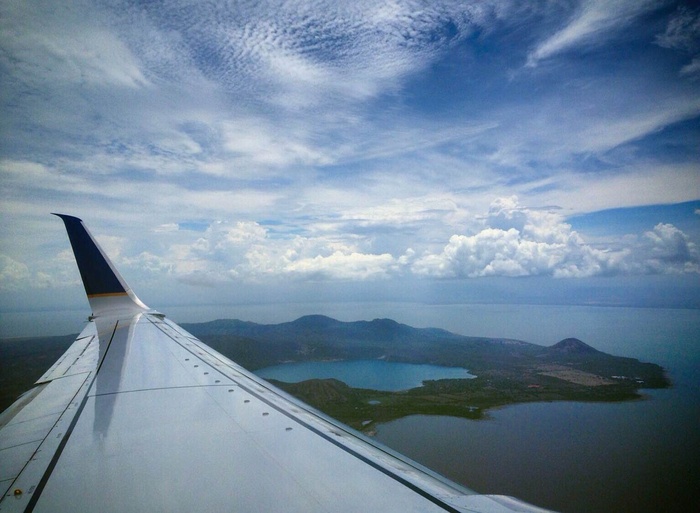 View of the ocean from a window of a plane