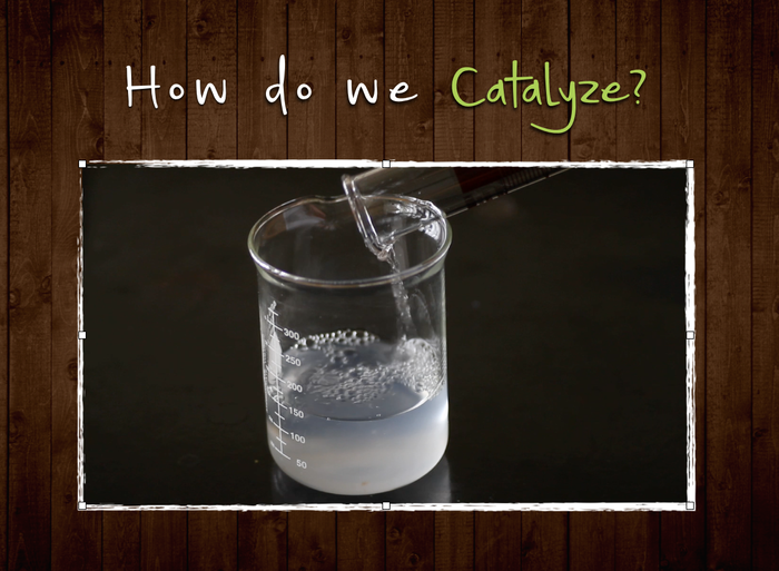 Water being poured into science beaker